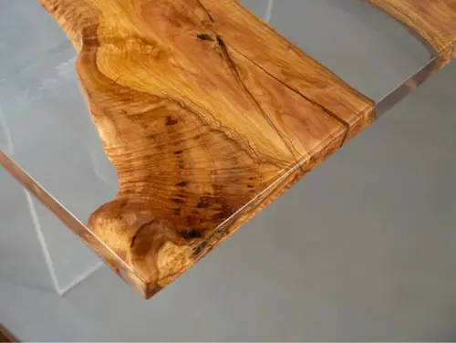 Mango wood dining table with ocean wave turquoise resin
